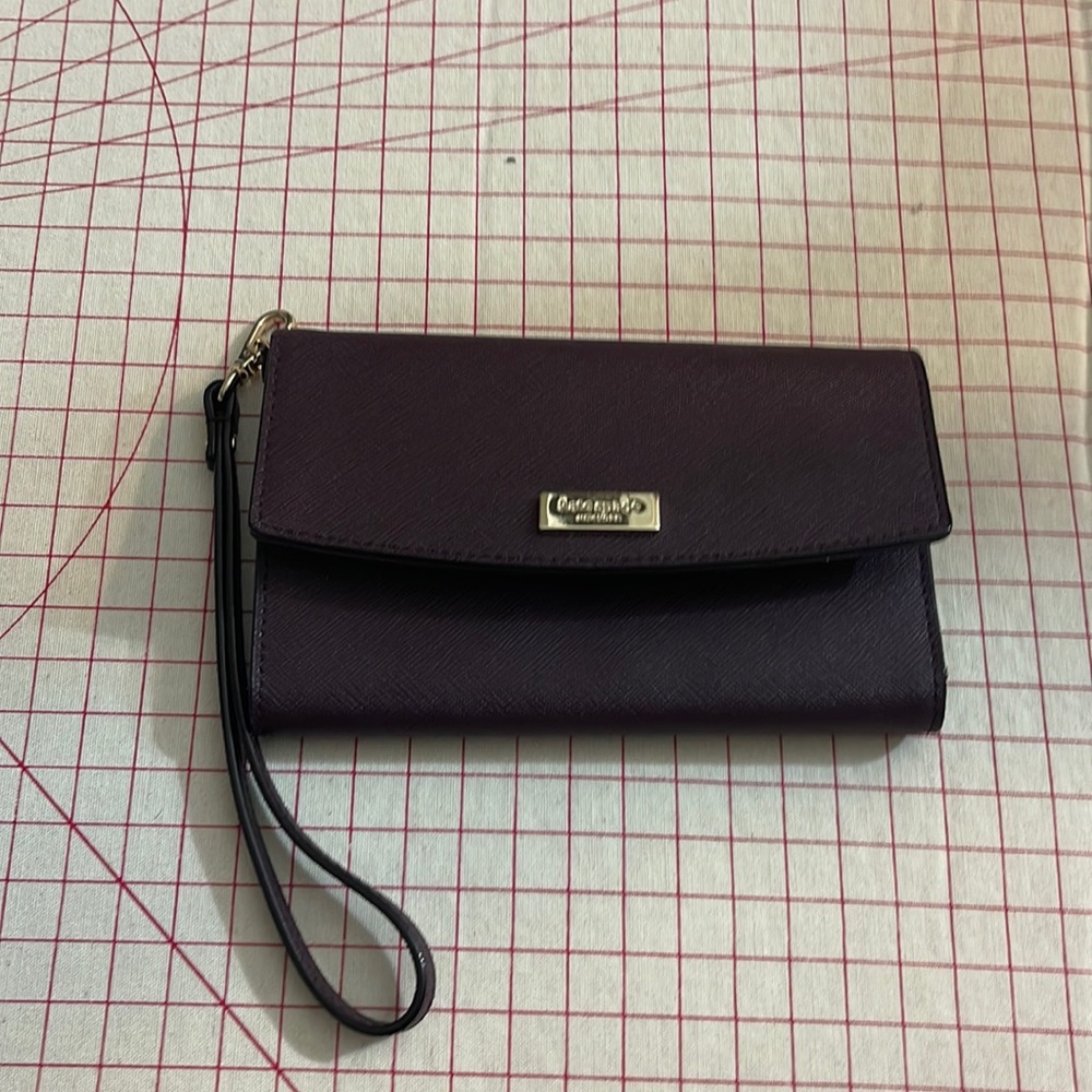 Never used Kate Spade wine color wristlet with phone holder and wallet
